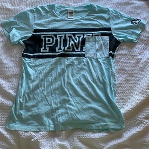 Worn once, medium, color baby blue, PINK T-shirt